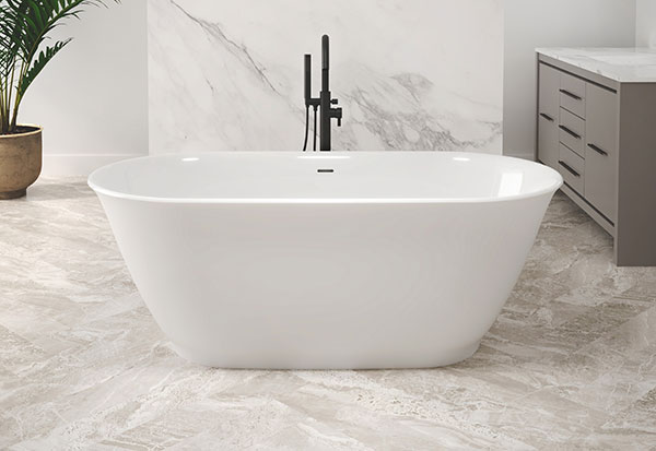 An oval matte white bathtub with a glossy white interior in a luxurious bathroom setting