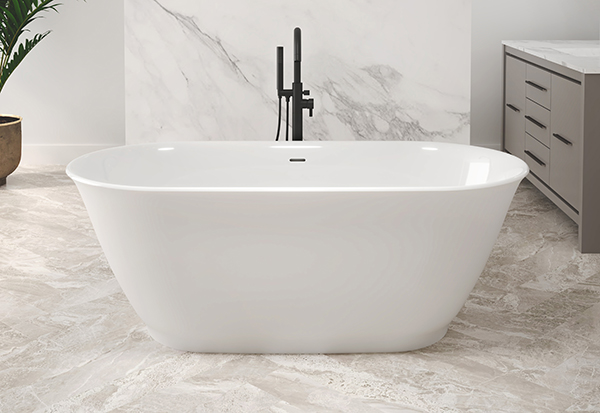 An oval shaped solid surface freestanding bathtub as a centerpiece in an elegant bathroom setting